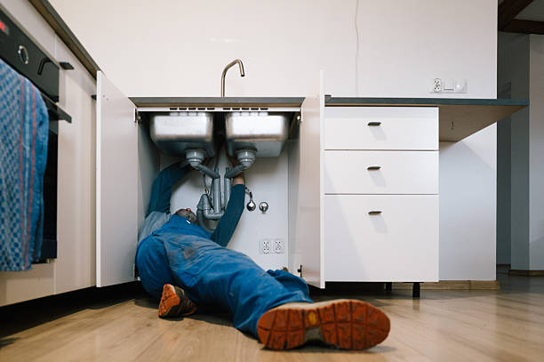 Professional Drain Cleaning technician working in Wolfe City, TX